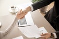 Male and female hands shaking, signing contract, top view closeu Royalty Free Stock Photo