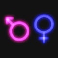 Male and female icon neon symbols together