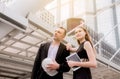 Male and female industrial engineers working and discussing on building site,Start up new project Royalty Free Stock Photo