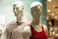 Male and female mannequins in the window of a clothing store. Fashion & Style. Close-up Royalty Free Stock Photo