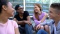 Male and female millennials smiling each other sitting aside, romantic relations