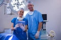 Male and female nurse using digital tablet in operation theater Royalty Free Stock Photo