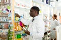 Pharmacists working in drugstore