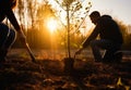 Male and female planting trees at sunset. Couple digging a hole in the ground for the future young plant. Generative AI