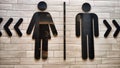 Male and Female Restroom Symbols on a Wooden Wall With Directional Arrows. Gender-specific bathroom signs on wood Royalty Free Stock Photo