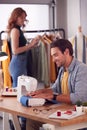 Male And Female Students Or Business Owners Working In Fashion Studio Together Royalty Free Stock Photo