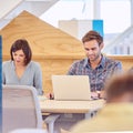 Male and female students busy studying hard together