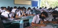 Students engaged in a learning activity in school in Sri Lanka.