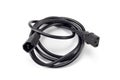 Male and female three pin power cable. Black plastic appliance connection cord with plugs.