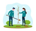 Male and female volunteers planting green trees Royalty Free Stock Photo