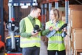 Warehouse service and Management System. Worker with barcode scanner Royalty Free Stock Photo