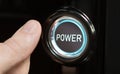 Male finger pushing button with text Power Royalty Free Stock Photo