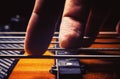 Male Fingers on a Bass Guitar Royalty Free Stock Photo