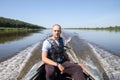 Male fisherman on boat