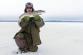Male fisherman holding big fish Northern pike, and trophy. Winter fishing. Fishing in the winter Royalty Free Stock Photo