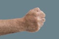 Male Fist aggressive isolated on pastel color background