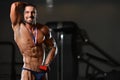 Male Fitness Competitor Showing His Winning Medal Royalty Free Stock Photo