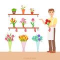 Male Florist In The Flower Shop Demonstrating The Assortment