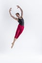 Male Flying Dancer. Contemporary Art Ballet With Young Flexible Athletic Man Posing in Flying Dance Pose With Hands Connected