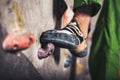 Male foot on climbing wall