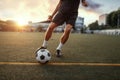 Male football player hits the ball on the field Royalty Free Stock Photo