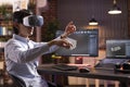Male freelancer developing digital container with virtual reality headset Royalty Free Stock Photo