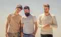 male friendship. Business team. Young guys wear casual style. handsome guys outdoor. best friends. Social. group of four Royalty Free Stock Photo