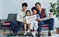 Male gay taking care adopted children who are happy diverse little Caucasian girl and African boy, happily smiling, drawing family Royalty Free Stock Photo