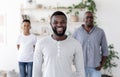 Male Generations. Happy Black Man On Foreground Posing With His Son And Dad At Home Royalty Free Stock Photo