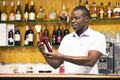 The male gives a glass of red wine Royalty Free Stock Photo