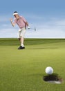 Male Golfer Cheering While Playing Golf