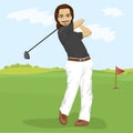 Male golfer hitting golf shot with club on course Royalty Free Stock Photo