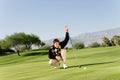 Male Golfer Lining Up Putt Royalty Free Stock Photo