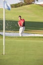 Male Golfer Playing Bunker Shot Royalty Free Stock Photo