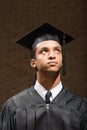 Male graduate looking up Royalty Free Stock Photo