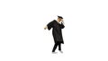 Male graduate in robe and mortarboard doing modern dance looking Royalty Free Stock Photo