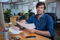 Male graphic designer at desk