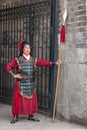 Male guard in traditional garb at North Gate of Shuncheng Wall, Xian, China