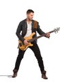 Male guitarist with bass guitar. Royalty Free Stock Photo