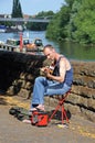 Male guitarist busking, Chester.