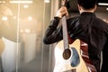 Male guitarist holding acoustic guitar