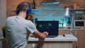 Male hacker failing in coding a dangerous virus