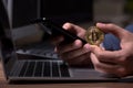 Male hacker hacking security firewall late in office