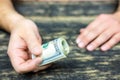 Male hand with a bundle of money Royalty Free Stock Photo