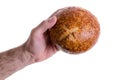 Male hand giving a sourdough bread roll Royalty Free Stock Photo