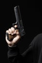 Male hand with gun isolated on black Royalty Free Stock Photo
