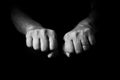 Male hand held out, with clenched fists Royalty Free Stock Photo