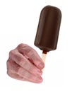 The male hand hold a chocolate popcicle ice cream Royalty Free Stock Photo