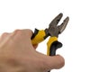 Male hand hold yellow pliers isolated white background Royalty Free Stock Photo