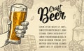 Male hand holding beer glass. Craft Beer calligraphic lettering